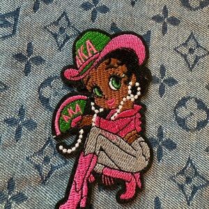 Embroidered Cartoon AKA Iron on Patch with Pink and Green Accents